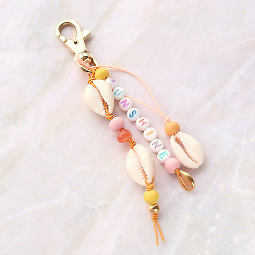 Beachy sieraden met houten kralen, schelpen en DQ metaal!
