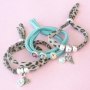 Trendy en universele armbandjes die je ook kan gebruiken als haarelastiek van stitched elastisch lint Ibiza!