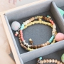 Caribische sieraden met kokos kralen en kleurige kralen