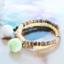 Caribische sieraden met kokos kralen en kleurige kralen