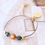 Chique sieraden van Polaris Elements kralen in warme kleuren