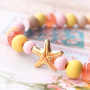 Beachy sieraden met houten kralen, schelpen en DQ metaal!