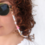 Vrolijke enkelbandjes, armbandjes en zonnebrilkoord met kwastjes voor de zomer