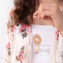 Festival sieraden inspiratie met veertjes en kleurrijke rotan hangers