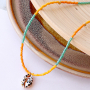Maak kleurrijke sieraden met kauri schelpjes en zo draag je zomerse haaraccessoires: