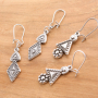 Sleutelhangers en sieraden van DQ metaal met een zomerse look 
