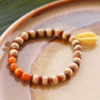 All natural! Zo maak je het perfecte armbandje met houten kralen
