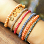 Tips om je top facet armbandjes te versieren met DQ metalen bedels: