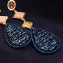 Maak schitterende oorbellen in winterse kleuren met deze facet hangers