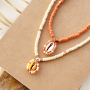 Zo maak je zelf trendy zomerse sieraden met kauri schelpen