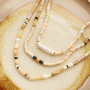 Maak een mooie zomerse sieraden set met deze natuursteen discs kralen: