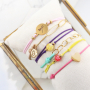 Inspiratie nodig? Zo maak je eenvoudig trendy armbanden van elastisch draad: