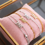 Deze sieraden kun je maken met de nieuwe stainless steel jaartal tussenstukken: