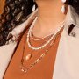 Chain sieraden in combinatie met zoetwaterparels en schelp kralen