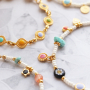 Lees hier hoe je trendy sieraden maakt met rainbow DQ metalen kralen, bedels en tussenstukken 