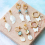 Ontwerp sieraden met een zomerse look met nieuwe schelp bedels 