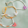 Maak je eigen zomerse sieraden met deze kleurrijke vlinder bedels en tussenstukken