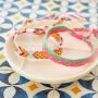 Zo presenteer je trendy armbanden en enkelbandjes