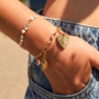Cre&euml;er vrolijke kettingen en armbanden met roestvrij stalen hartjes bedels