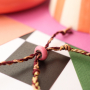 Cre&euml;er kleurrijke armbanden met smart bead stoppers 