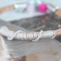 Faux eco Nappa leer gestikt en heldere kleuren kralen samengevoegd tot een hippe sieraad creatie!