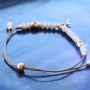 Sieraden set met ethnic look gemaakt van metaal DQ in ros&eacute; goud & macram&eacute; draad! 